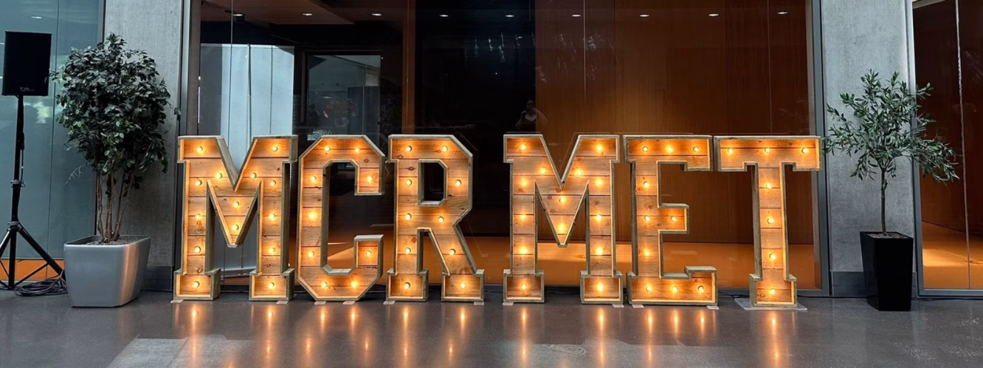 Lit-up sign saying 'MCR MET'